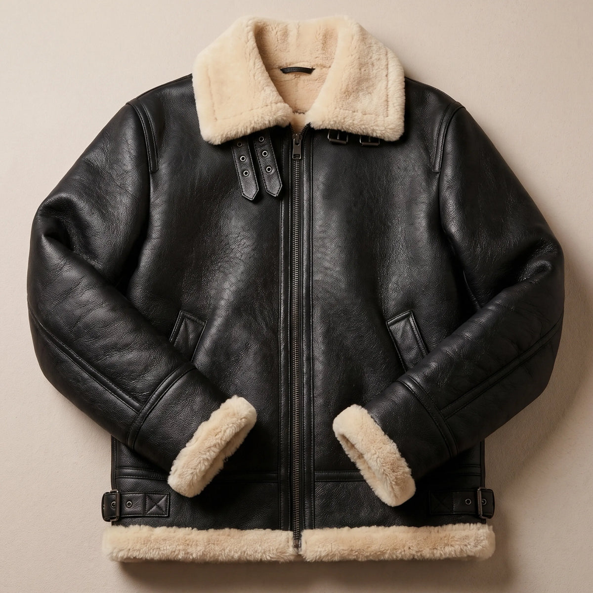 Black B-3 leather aviator jacket with shearling collar worn with dark jeans, full-length view