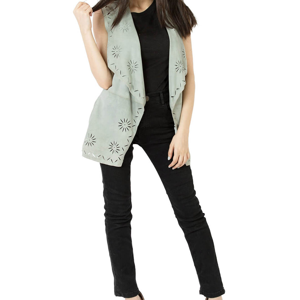 Woman wearing trendy slim-fit handcrafted leather sweater, versatile for both casual and dressy occasions.