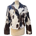 Elegant black and white women's cowhide leather jacket, showcasing stylish design and handcrafted quality.