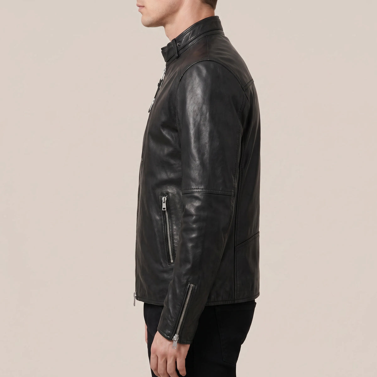 Side zip pocket on jet black cowhide leather jacket