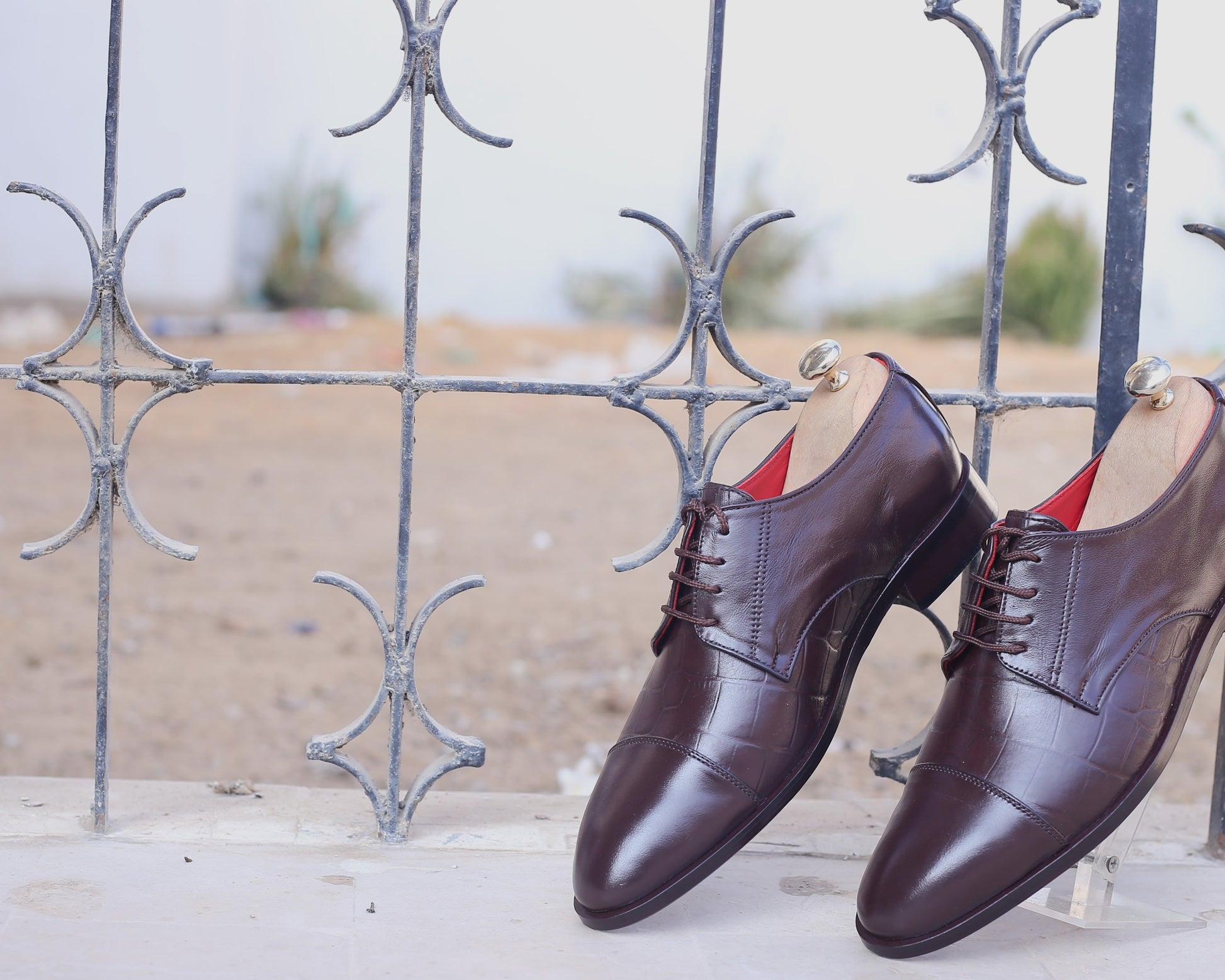A photo of brown leather derby oxford dress shoes