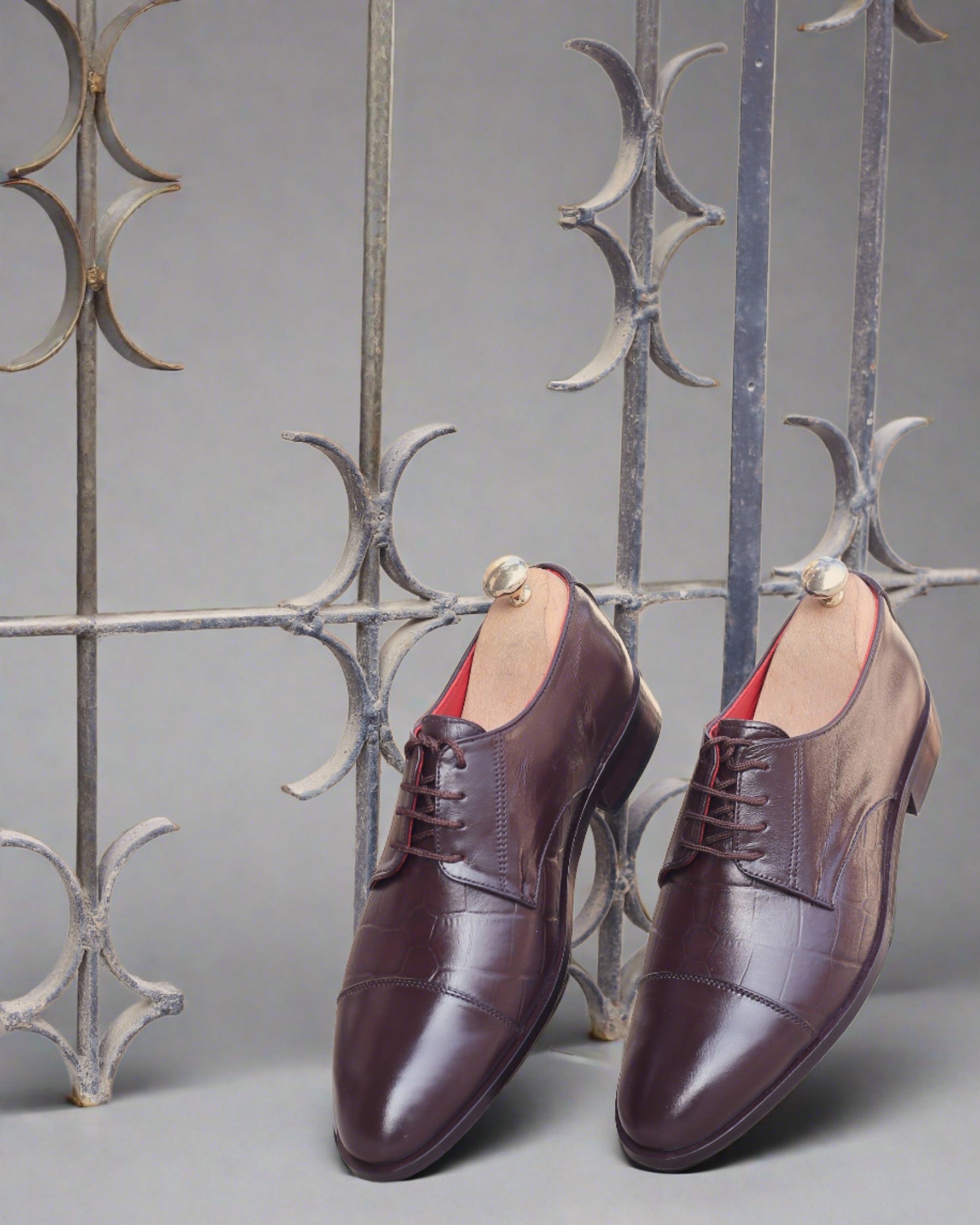 A photo of brown leather derby oxford dress shoes