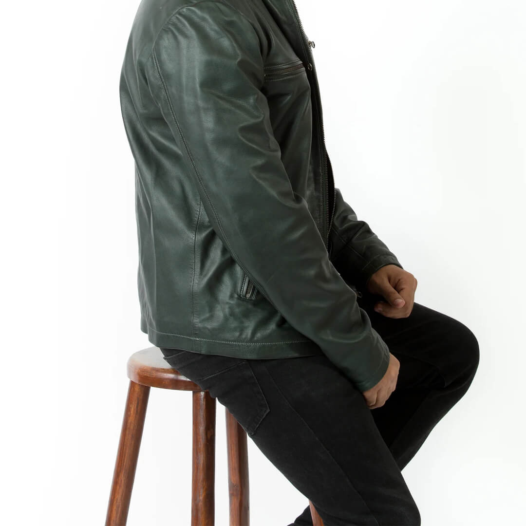 Distressed green leather jacket for men, classic motorcycle style, infused with urban fashion sensibilities, displayed on a neutral background.