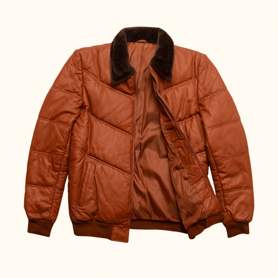 Warm Griffin Puffer Jacket in rich brown color, displayed as essential gear for cold climates, highlighting style and warmth.