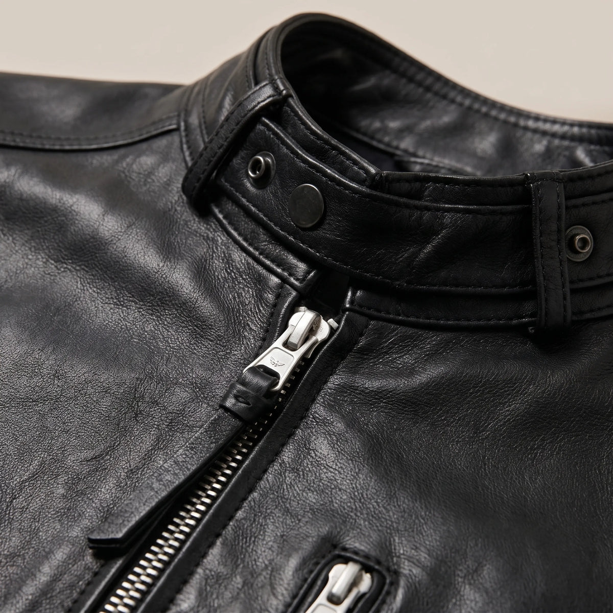 Close-up of soft full-grain jet black cowhide leather