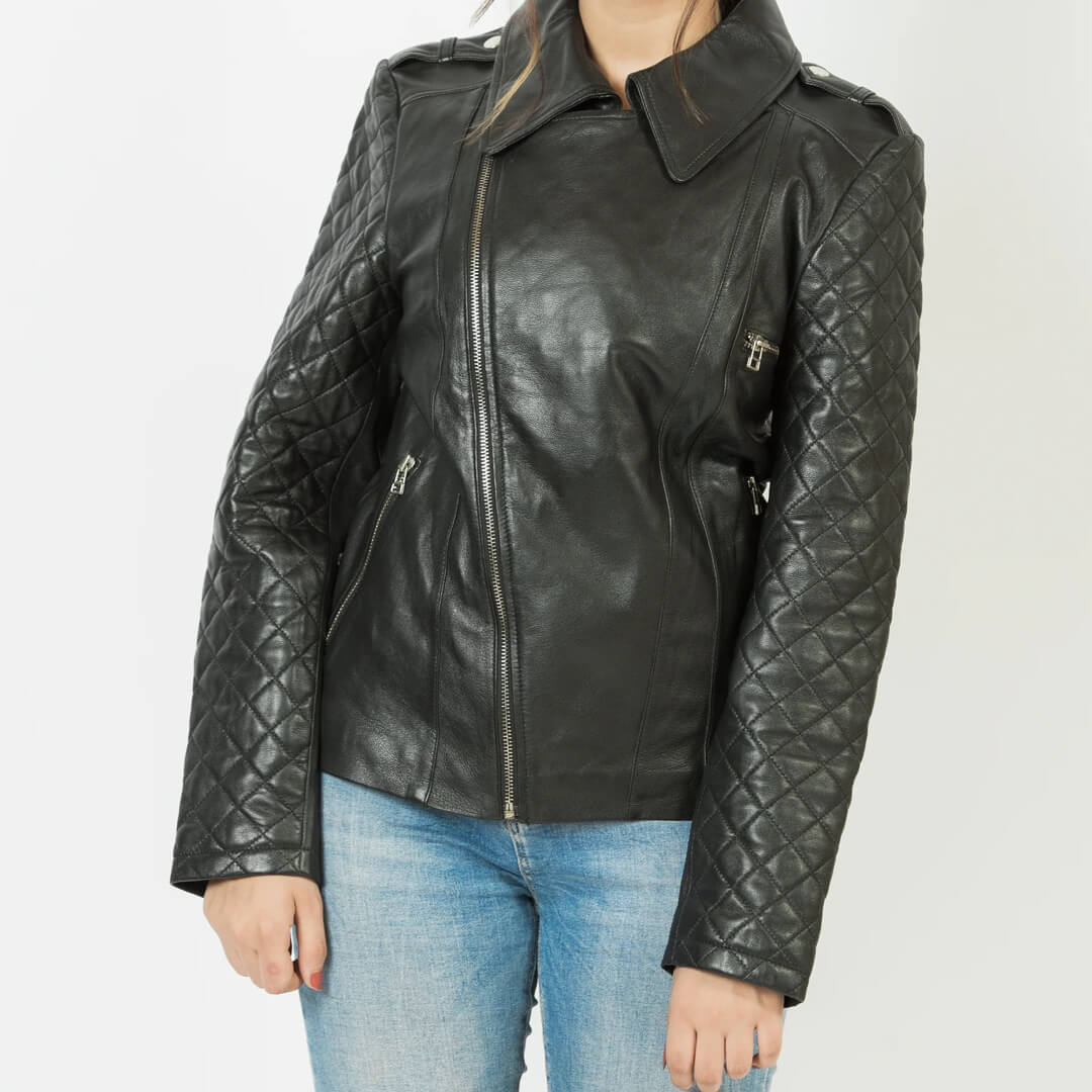 Stylish woman's black leather biker jacket, classic motorcycle design, made with genuine leather for a sleek look.