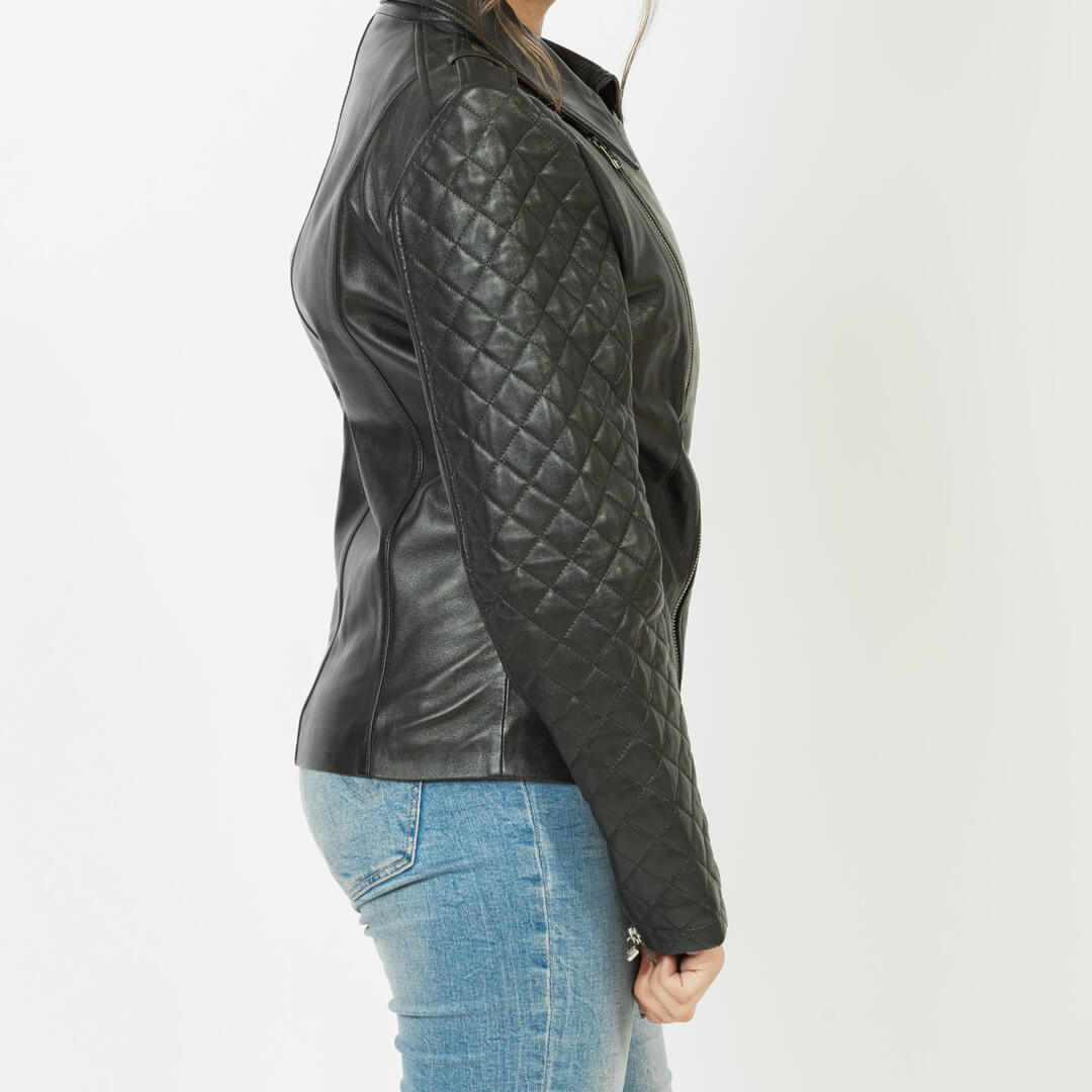 Stylish woman's black leather biker jacket, classic motorcycle design, made with genuine leather for a sleek look.