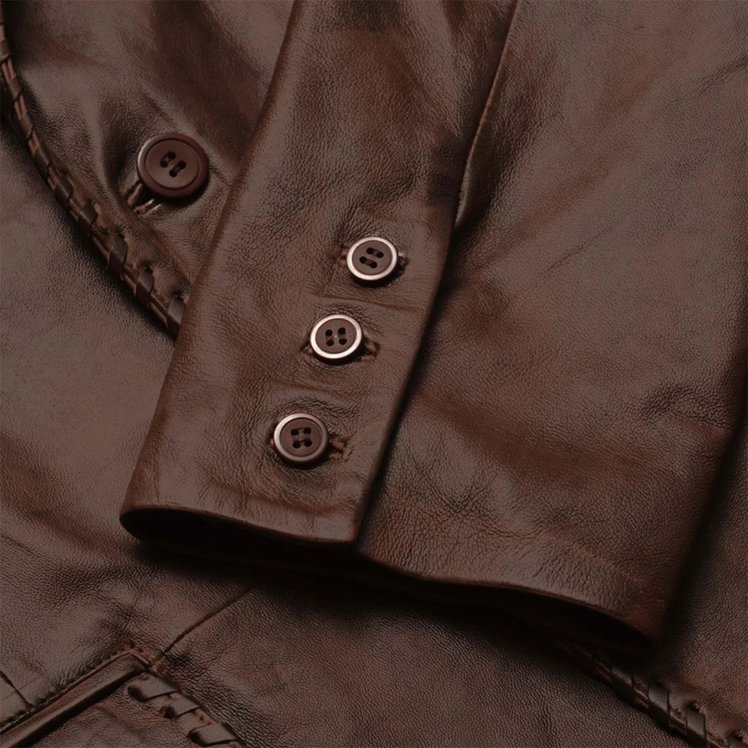 Classic tailored men's brown leather blazer, versatile and stylish outerwear for a polished look.