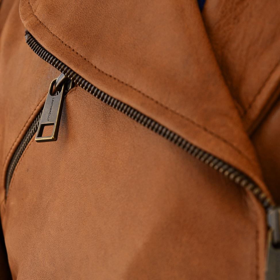 Men's brown lambskin biker jacket. Soft, luxurious leather with belt, zippered pockets, and adjustable cuffs for a comfortable fit.