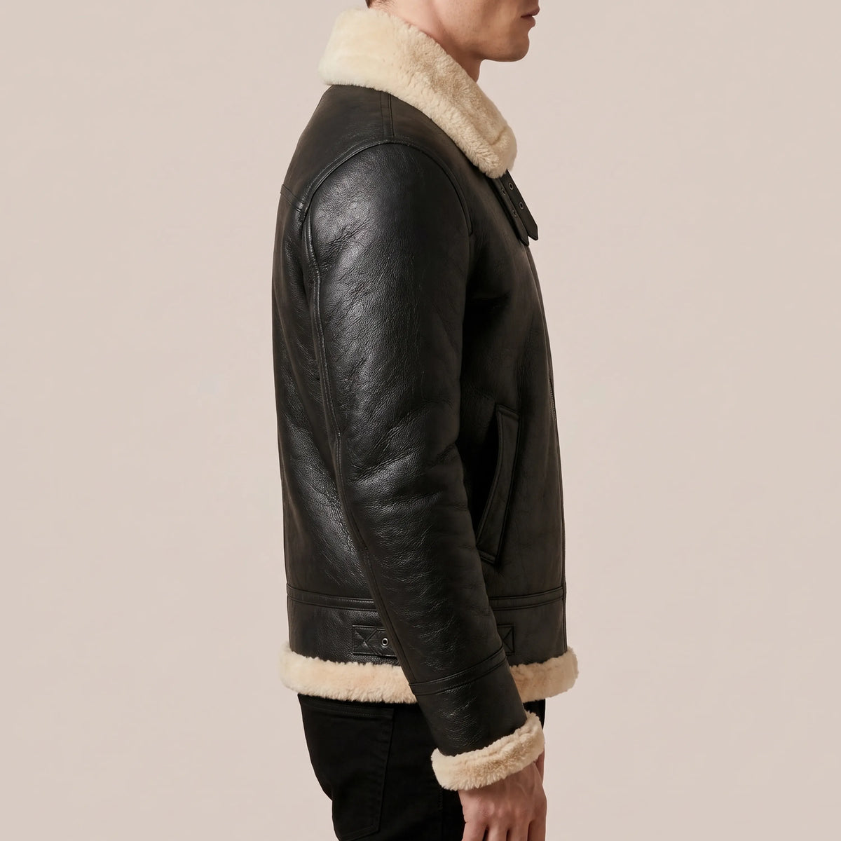 Side view of men’s black leather B-3 shearling aviator jacket