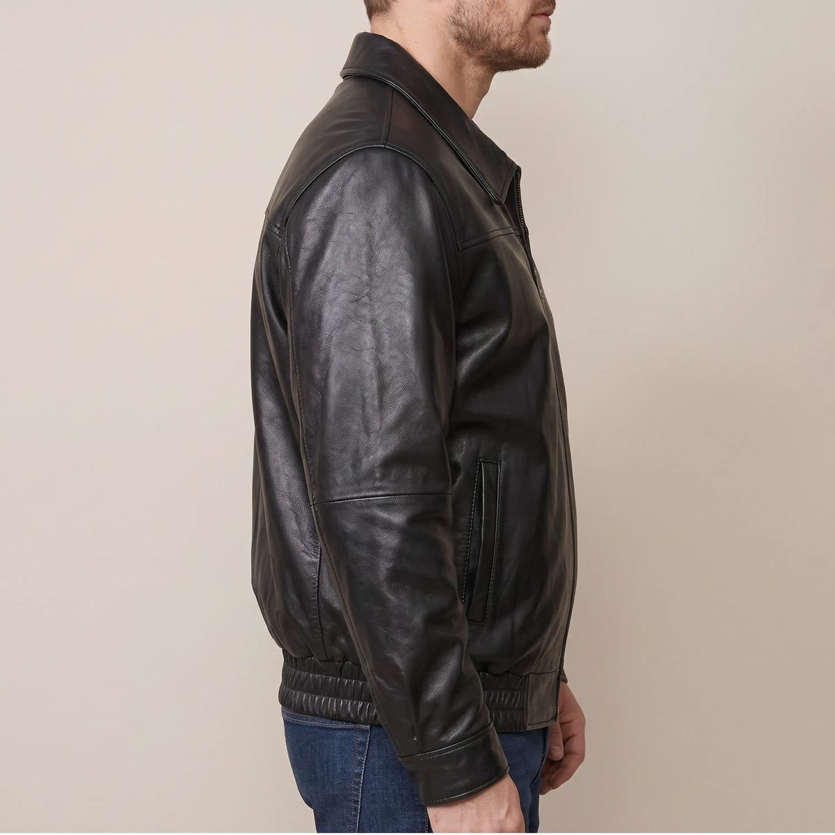 Side view of men’s vintage lambskin leather bomber jacket