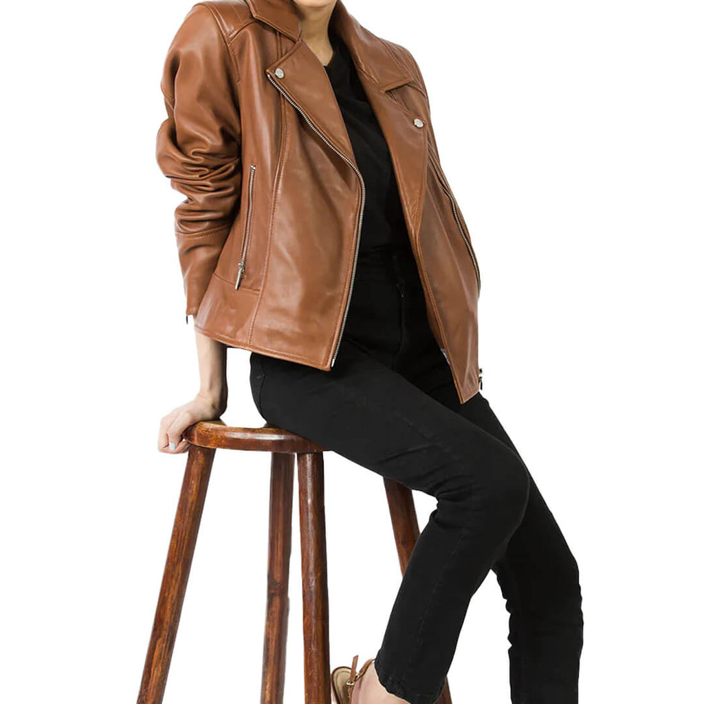 Stylish woman's brown leather biker jacket showcasing classic fit and durability, ideal for trendy and resilient fashion outerwear.