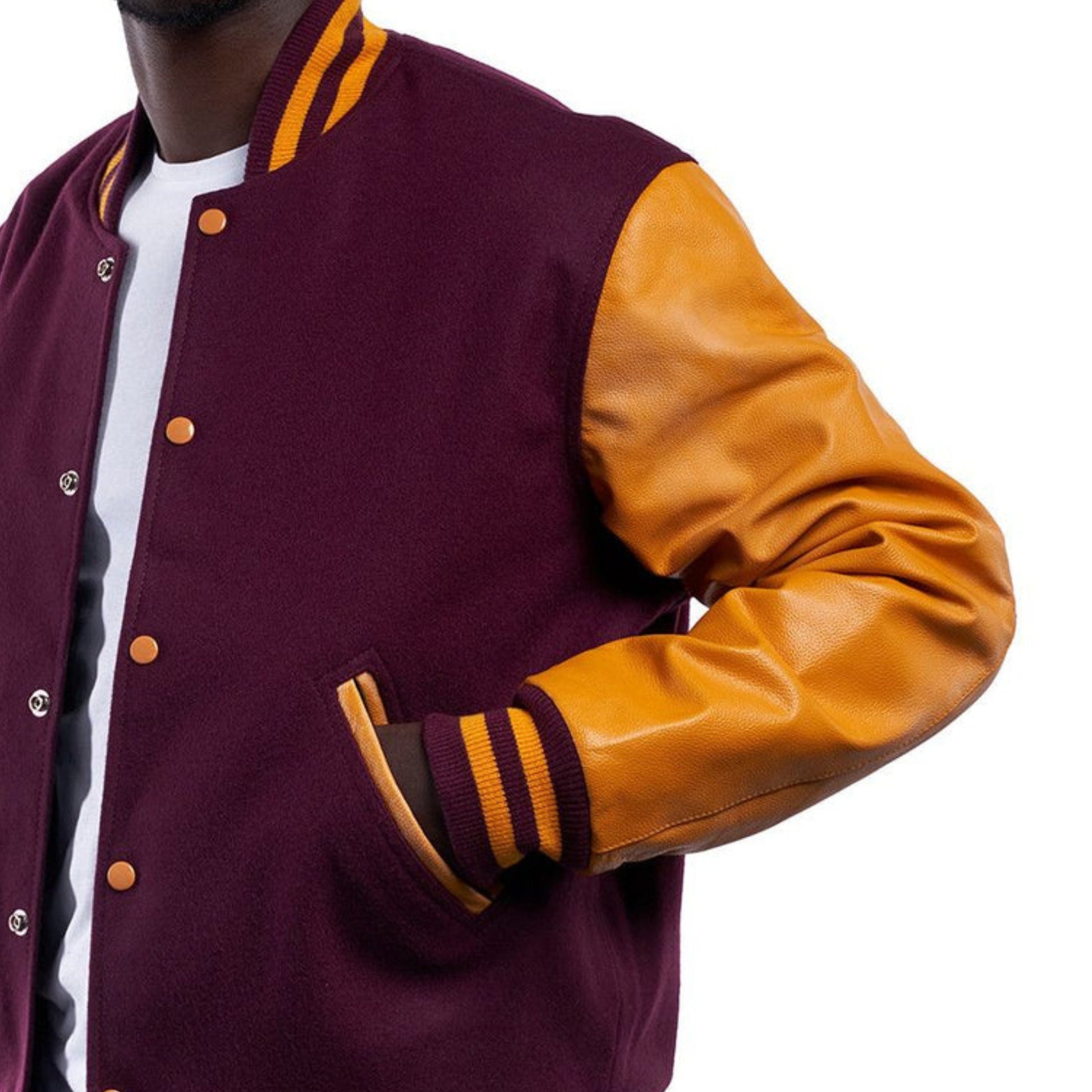 A Maroon varsity jacket with Yellow leather sleeves. The jacket has yellow and black striped cuffs, collar, and waistband.